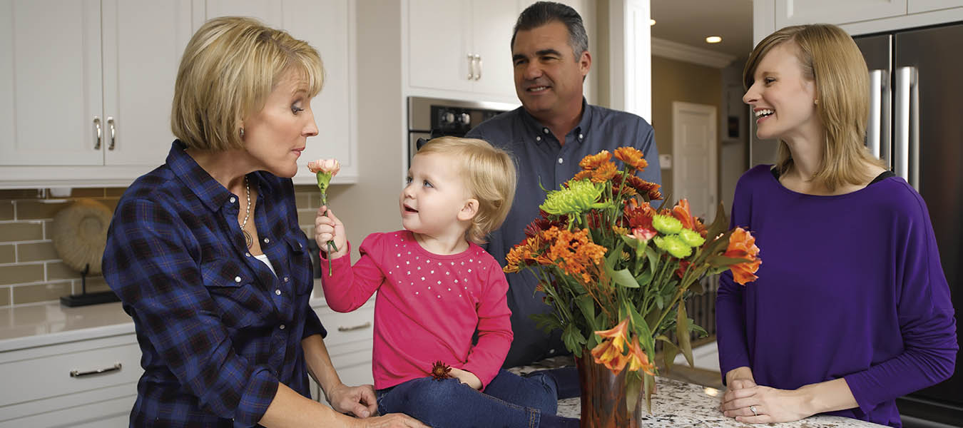 family and baby in kitchen